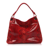 Serpentine prints Leather Handbags